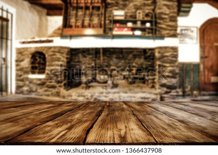 Wooden desk of free space and fireplace. Wild west background of home interior. 