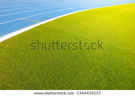 running track/The football field has a running track/Empty running track for the background with copy space