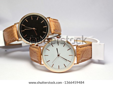 Plain stylish classic white dial black dial combo analog watches with genuine leather brown strap Royalty-Free Stock Photo #1366459484