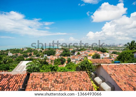 A view of Olinda's historic center from the top of Alto da Se hill, Recife in the background - Pernambuco, Brazil