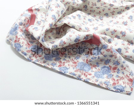 Beautiful Colorful Garment Fabric Textile with Artistic Ornaments Pattern in White Isolated Background