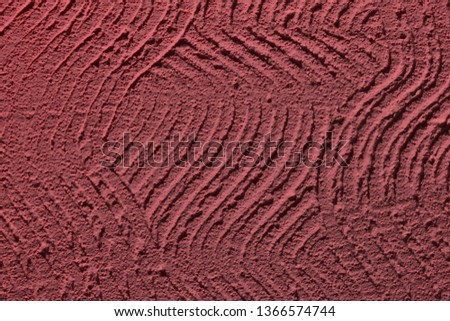 cute red brushed curvy paint on wall texture - abstract photo background