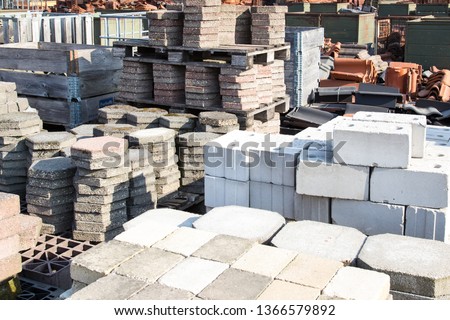 Reusable building materials from old houses and buildings. A good example of the circual economy. Royalty-Free Stock Photo #1366579892