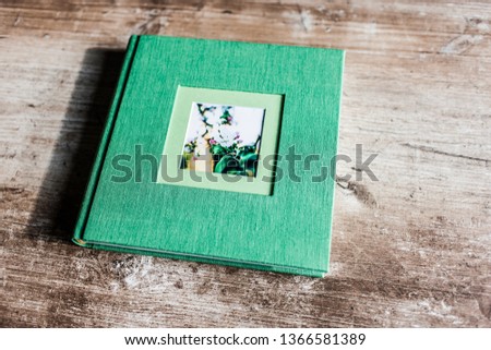 photobook with green cover