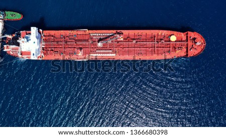 Aerial drone photo of industrial cargo tanker cruising the mediterranean deep blue sea