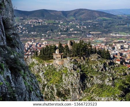 The ancient castle of Livadia, Greece and the modern town as seen from  Zoodohos Pigi hill top.