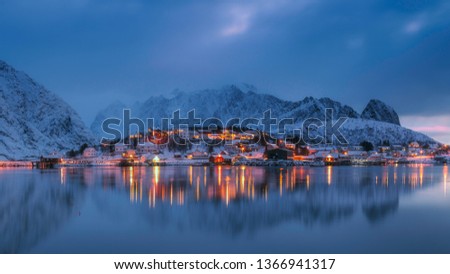 A snowy foggy frosty morning in a cozy Norwegian village. Magnetic view of the mountains behind the village. Norwegian village in the morning light. The perfect picture for suburban life.
Harbor.