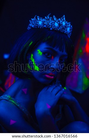Beautiful female as nefertity in neon light