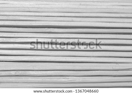 Black and white close up picture of a bamboo mat