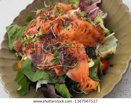 Smoked salmon salad in a bowl