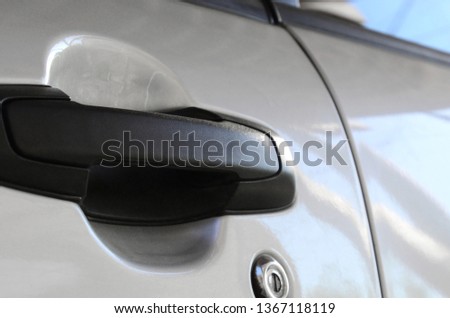 Close up black car door handle. Car equipment