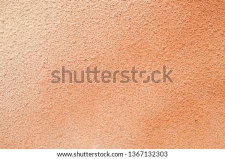 New colorful rough relief plaster on wall closeup
