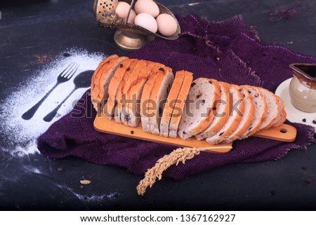 Stock photo of raisin bread that is made from raisins and flavored with cinnamon