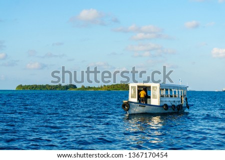 A dive boat in the Indian ocean in the Maldives.