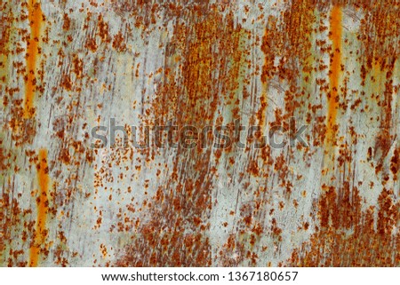 Old rusty metal seamless background. Grunge texture with scratches.
