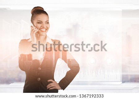 Double exposure image of businesswoman with smartphone on cityscape background