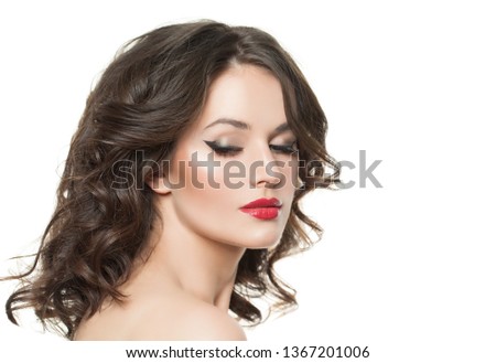 Woman face isolated. Pretty model with makeup and curly hair isolated on white