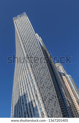 View of low rise skyscrapers with blue sky in Dubai. UAE.