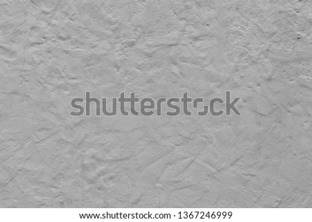 Gray painted wall with plaster