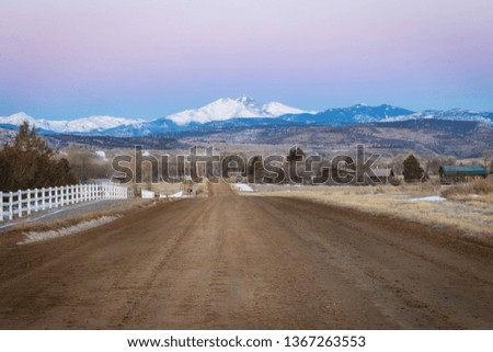A dirt road leads to Longs Peak in Northern Colorado on a beautiful winter's morning