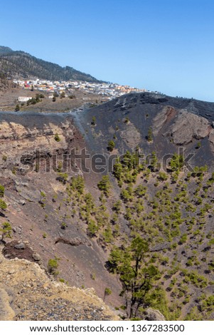 View of the San Antonio volcano crater  with fuencaliente village in background.  La Palma, Canary Islands. Spain.
