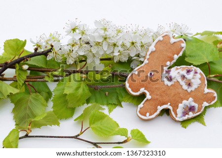 Easter composition with gingerbread and fresh spring vegetation