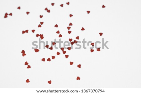 colored Sequin scattered on white background