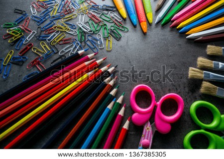 School supplies. Pencils, pens, scissors. Place for text.