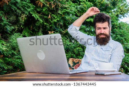 Write article for online magazine. Bearded hipster laptop surfing internet. Man looking for inspiration. Reporter journalist daily routine. Working online. Find topic write. Online mass media worker.