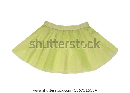 Girls clothes. Festive beautiful green glistening little girl short summer skirt isolated on a white background. Ballerina kids clothes.