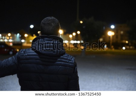 Man portrait by night in the city