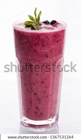 glass of smoothie on a white background Royalty-Free Stock Photo #1367531264