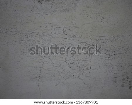 A blanked concrete wall. There’s no any signs or any words on a cement surface.