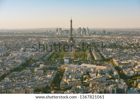 Panoramic aerial view of Paris and Eiffel Tower in golden hour