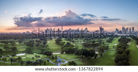 Panorama Aerial Drone Picture of the CBD Skyline of Manila, Philippines during Sunset