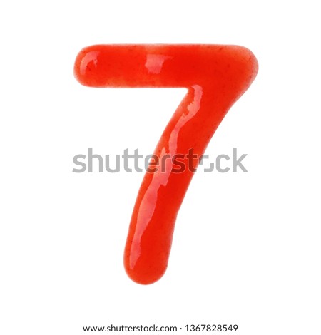 Number 7 written with red sauce on white background