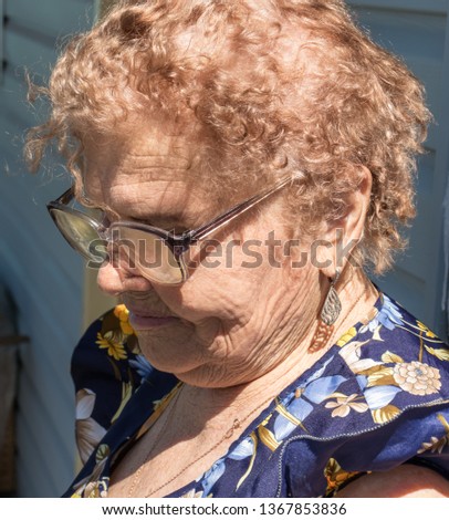 Grandma looks down