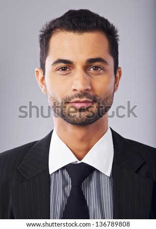 Closeup portrait of a confident middle eastern businessman Royalty-Free Stock Photo #136789808