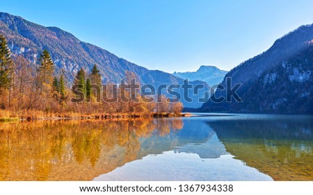 Hallstatt lake at sunny, blue sky and mountain Sarstein. Late autumn, Salzkammergut region, Austria. Royalty-Free Stock Photo #1367934338