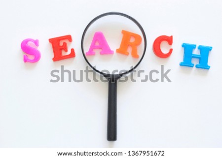 Word Search and magnifying glass on the light background. 