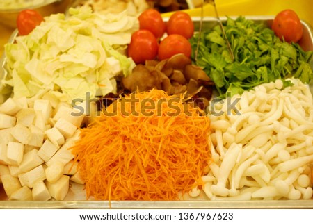 Prepared vegetables for stir-fry or spicy salad. Is a menu for vegetarian festivals.