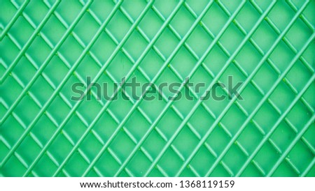 Metal bars on a green background, Metal mesh, metal texture, color background, abstraction, mesh wall, color metal