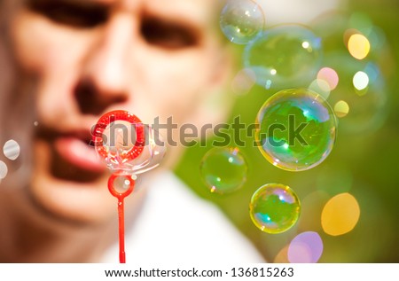 Blowing bubbles outdoor