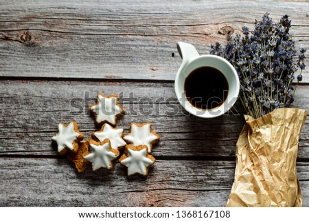 Coffe  ,lavender and star shaped  cinnamon cookies  on wooden background