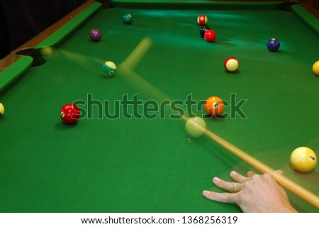 Side pocket shot on a pool table