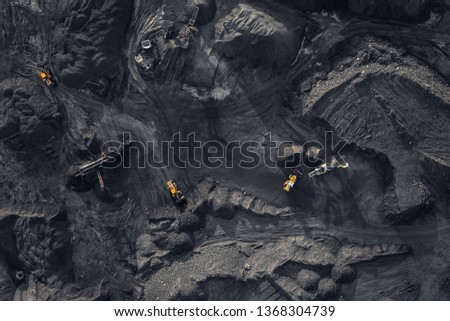Open pit mine, extractive industry for coal, top view aerial drone. Royalty-Free Stock Photo #1368304739