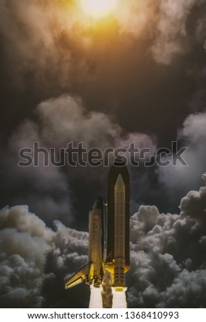 Rocket. Spaceship in the air, on the way to the outer space. Space mission. Elements are furnished by NASA.