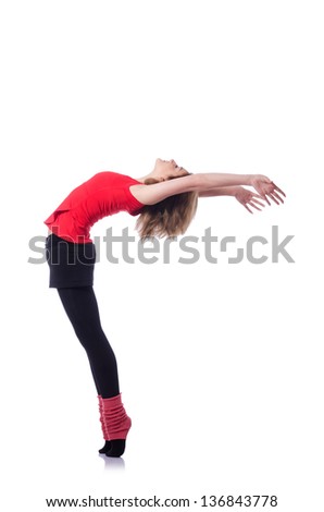 Young gymnast exercising on white