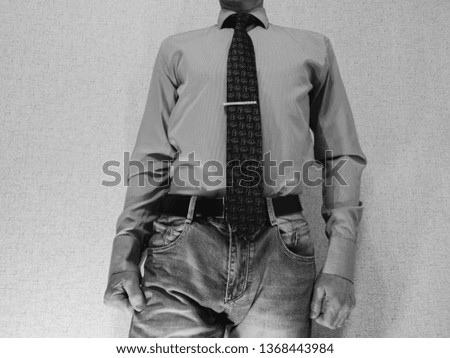Business man in jeans and tie close-up