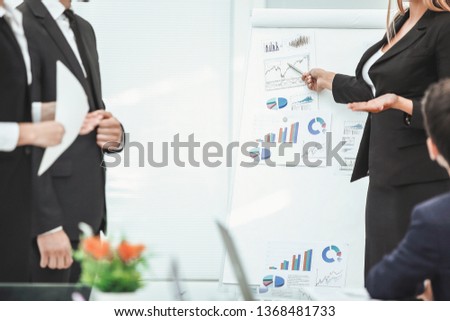close up. business woman making a presentation to his business team
